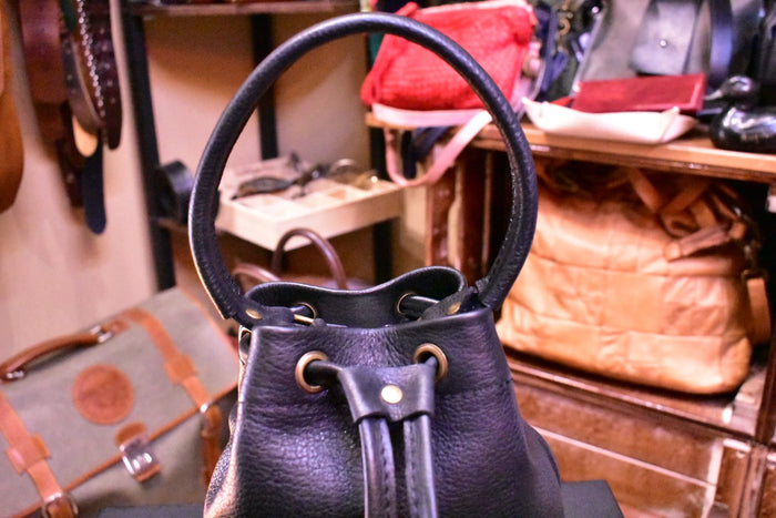 The Small Black Bucket Bag